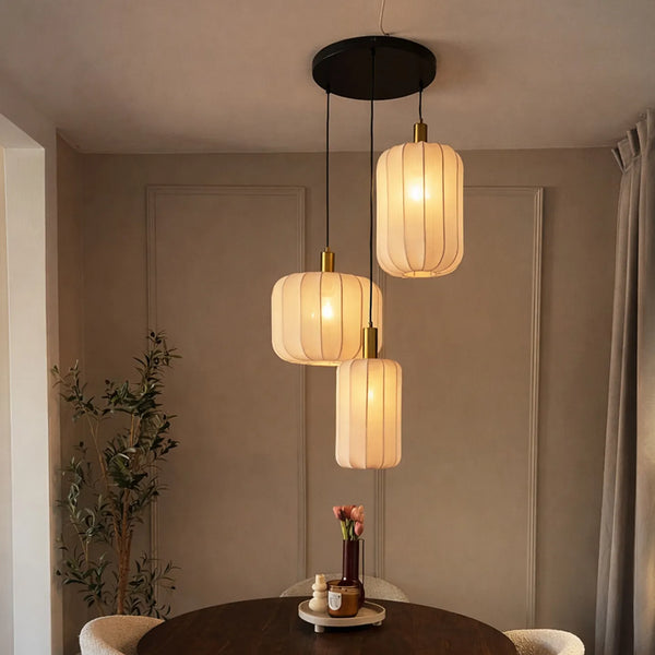 Japandi hanglamp Pluni zwart goud beige 3-lichts boven eettafel